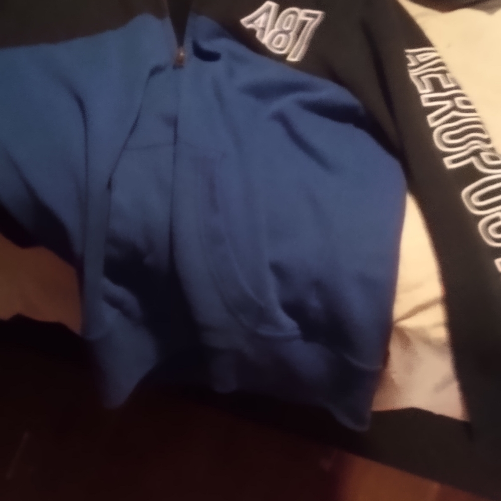 I'm selling an Aeropostale zip up hoodie blue and black